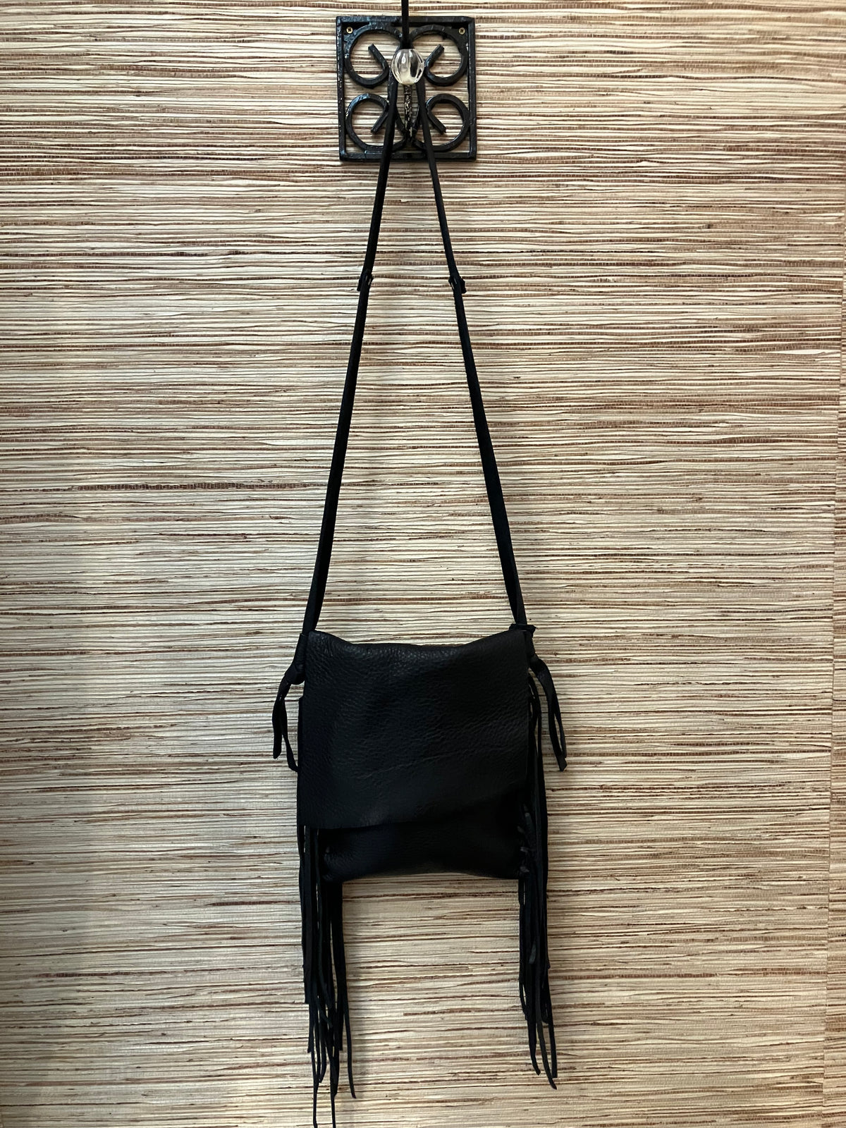 angela upcycled leather crossbody bags